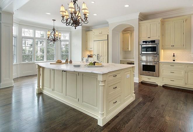 a modern kitchen with newly installed laminate floor in Galena OH